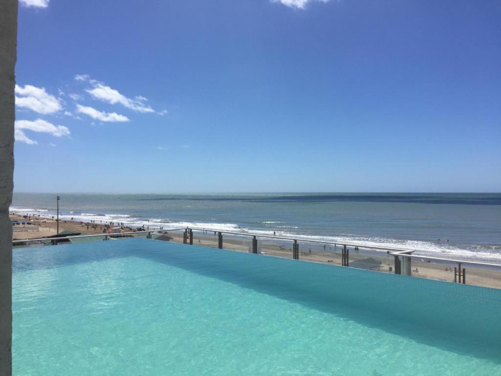 Eighteen Apartments Villa Gesell Bagian luar foto